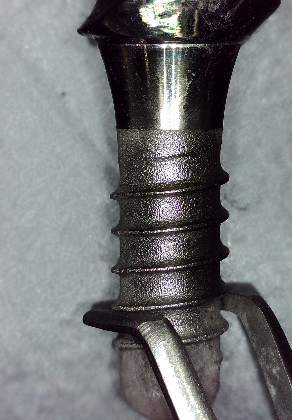 Removed implant A01 after debridement with the NiTi Brush